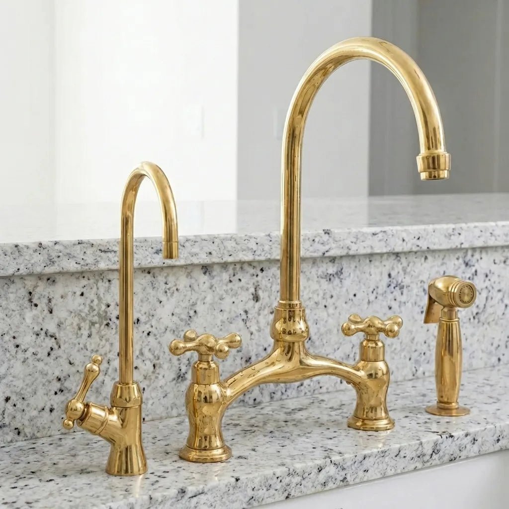 Vintage_style_brass_bridge_faucet_handheld_sprayer_beside_farmhouse_sink Victorian Unlacquered Brass Bridge Faucet With Side Sprayer - Image 1
